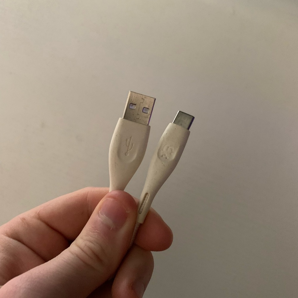 Cream USB-C Charger Cable with black block.